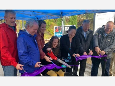 Depot Drenched, But Dedication Event Delights